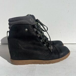 Stylish Black Ankle Boots with Brown Sole